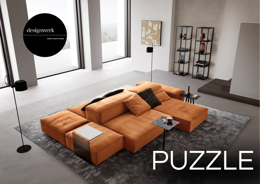 dunkelgraue Couch mit Aufschrift "Puzzle"